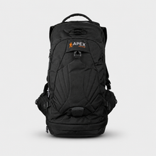 Load image into Gallery viewer, A black APEX 24 liter hydration outdoor backpack with a top handle, multiple zippered compartments, and side pockets, shown against a light gray background.