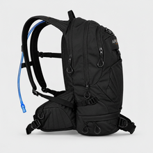 Load image into Gallery viewer, A black APEX pro series X24-h backpack with a blue hydration tube, shown from a three-quarters angle against a light gray background.
