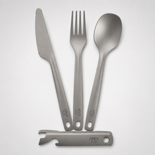 Load image into Gallery viewer, Four-piece titanium camping utensil set with a knife, fork, spoon, and a multi-tool bottle opener handle, all branded APEX, arranged on a light gray background.
