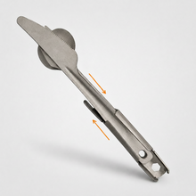Load image into Gallery viewer, APEX titanium kitchen cutlery set, shown on a light gray background with two orange arrows indicating direction of nesting motion.
