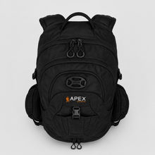 Load image into Gallery viewer, A black APEX Outdoor backpack shown from the top on a light gray background. The backpack features multiple zippered compartments, side pockets, and the Apex brand logo printed in orange and white on the front pocket.
