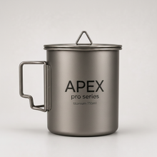 Load image into Gallery viewer, APEX titanium camping 750ml mug with a lid, featuring a folding side handle, set against a light gray background.
